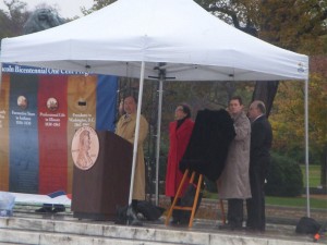 Director Moy and other dignitaries standing in front of the Capitol Dome